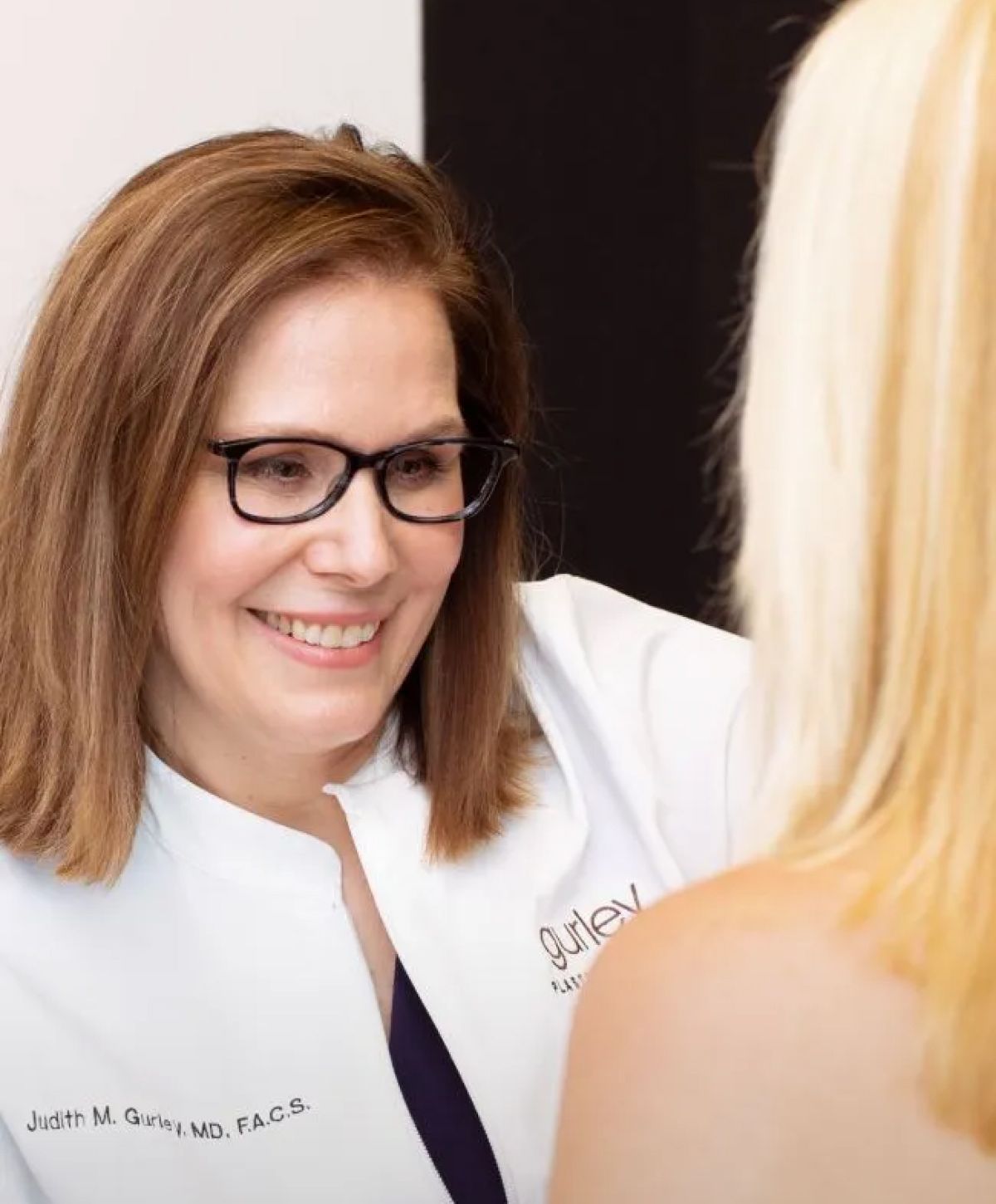 Chesterfield plastic surgeon, Dr. Judith Gurley with patient