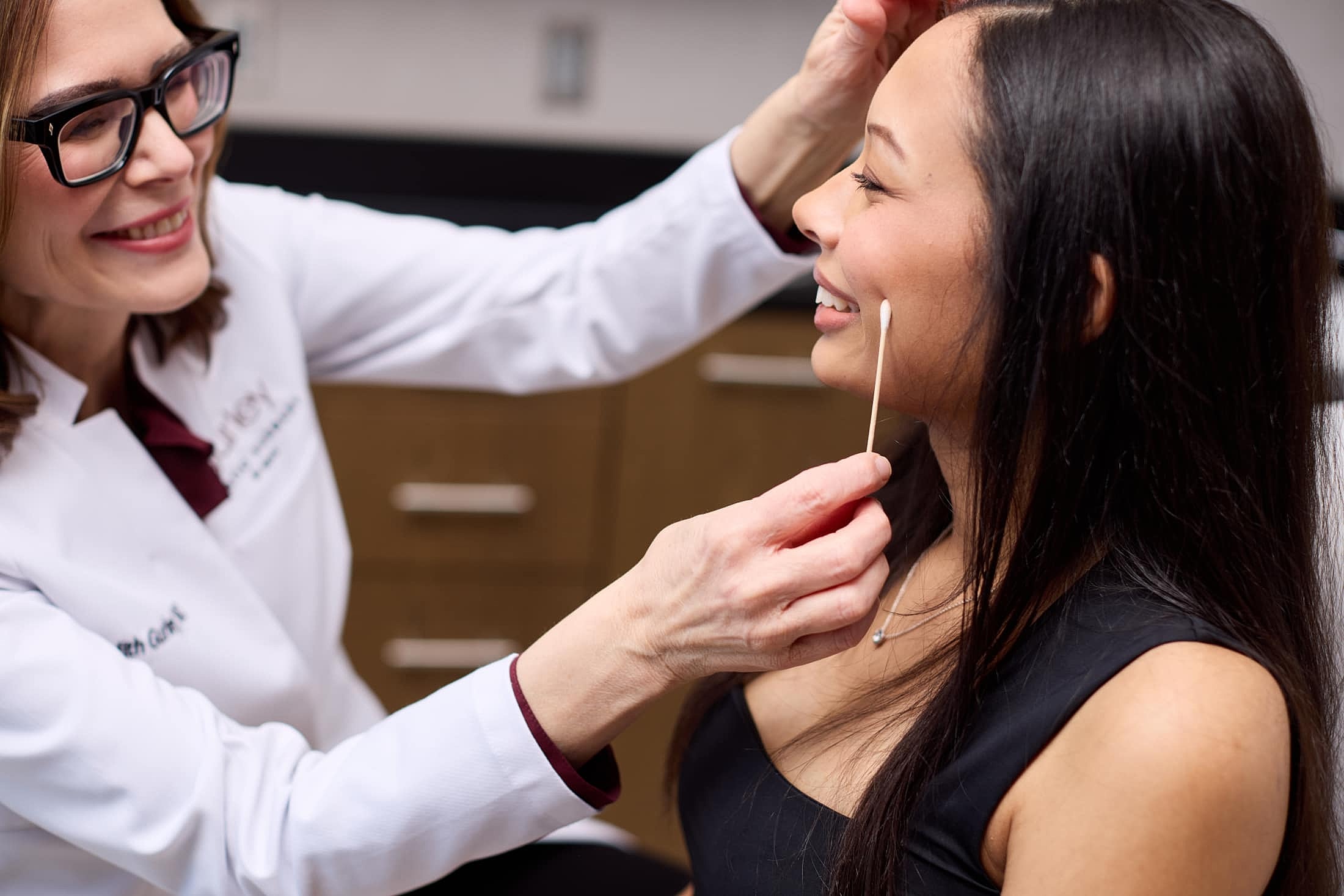 Patient receiving cosmetic treatment in clinic.