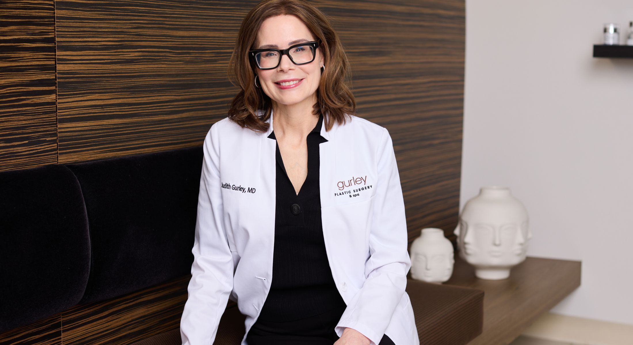 Chesterfield plastic surgeon, Dr. Judith Gurley sitting inside her practice